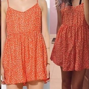 Kimchi Blue open back romper with floral design